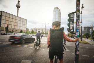 Cyclist waiting at a traffic light in Berlin