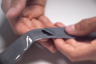 The patch is applied to the damaged section of the TPU hose